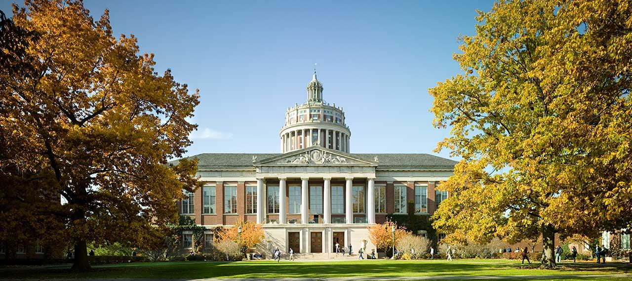 An exterior view of Rush Rhees Library as seen from Eastman Quad.